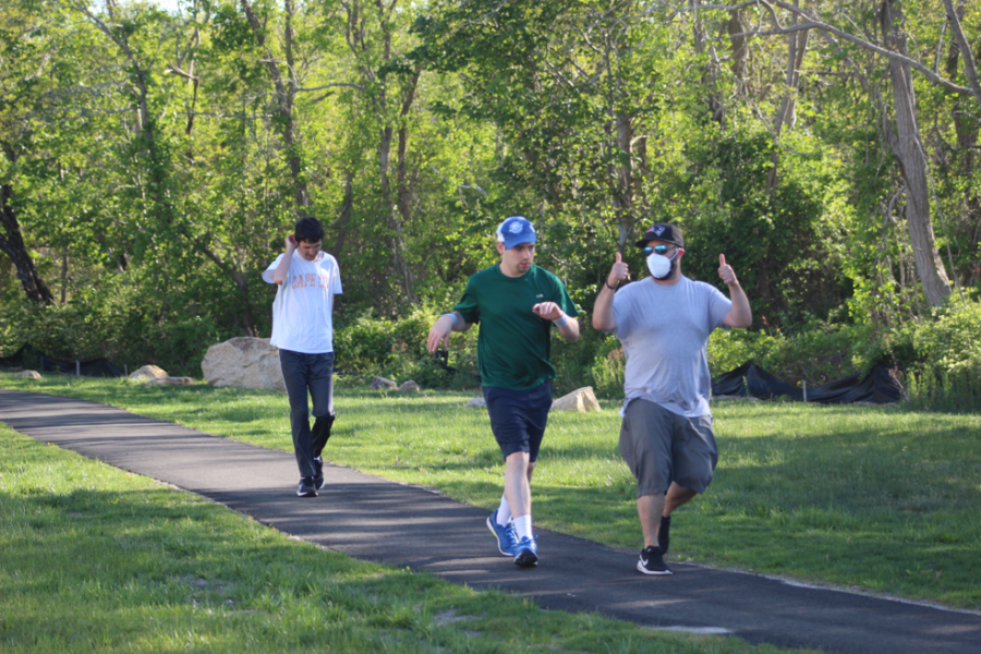 CCV residents and caregiver jogging on the bike path