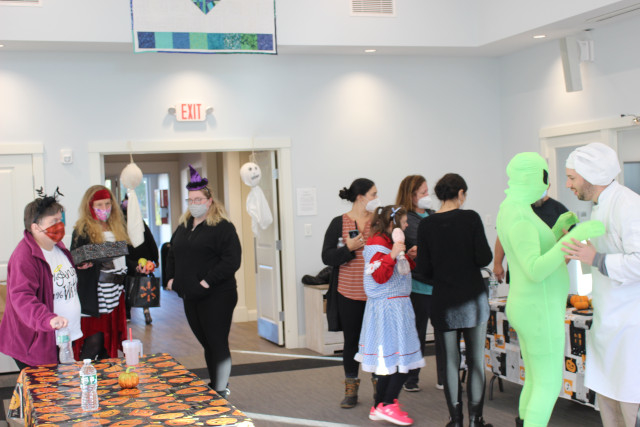 Halloween party with participants in costumes
